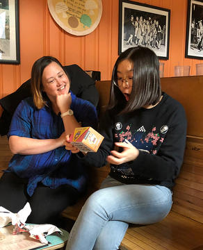 Minya opening her gift