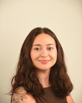 profile picture of a dark haired woman